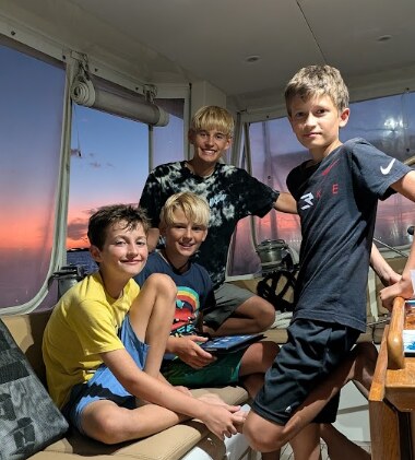 The kids and their cruising friends aboard